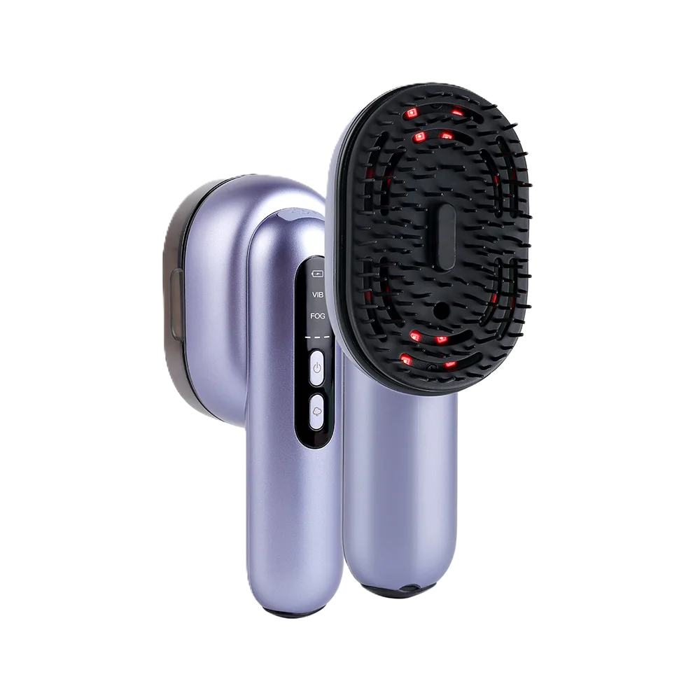 Cepillo con masaje vibratorio con atomizador y aplicador de aceite para el cabello.